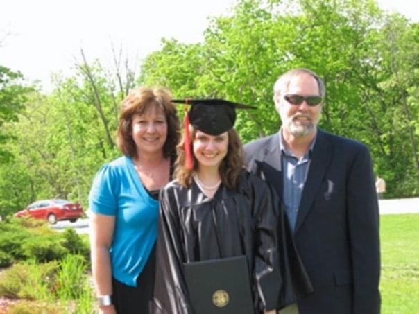 Callie Newton with her parents on her graduation day from the University of Missouri.
