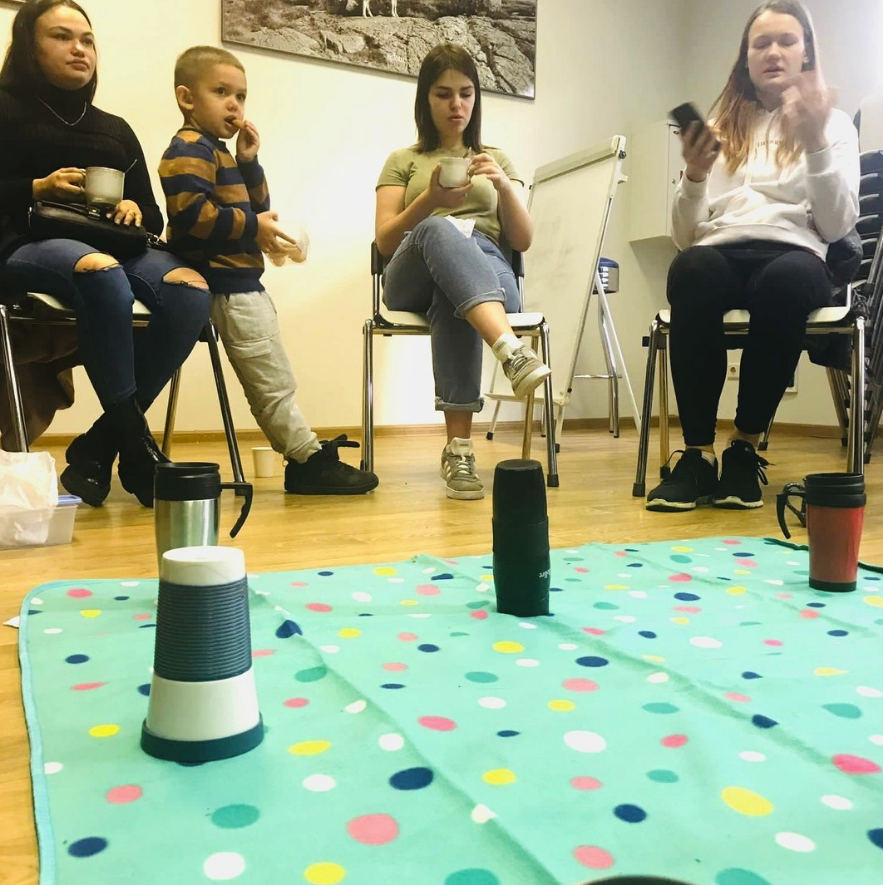 Participants wait to play flip the cups