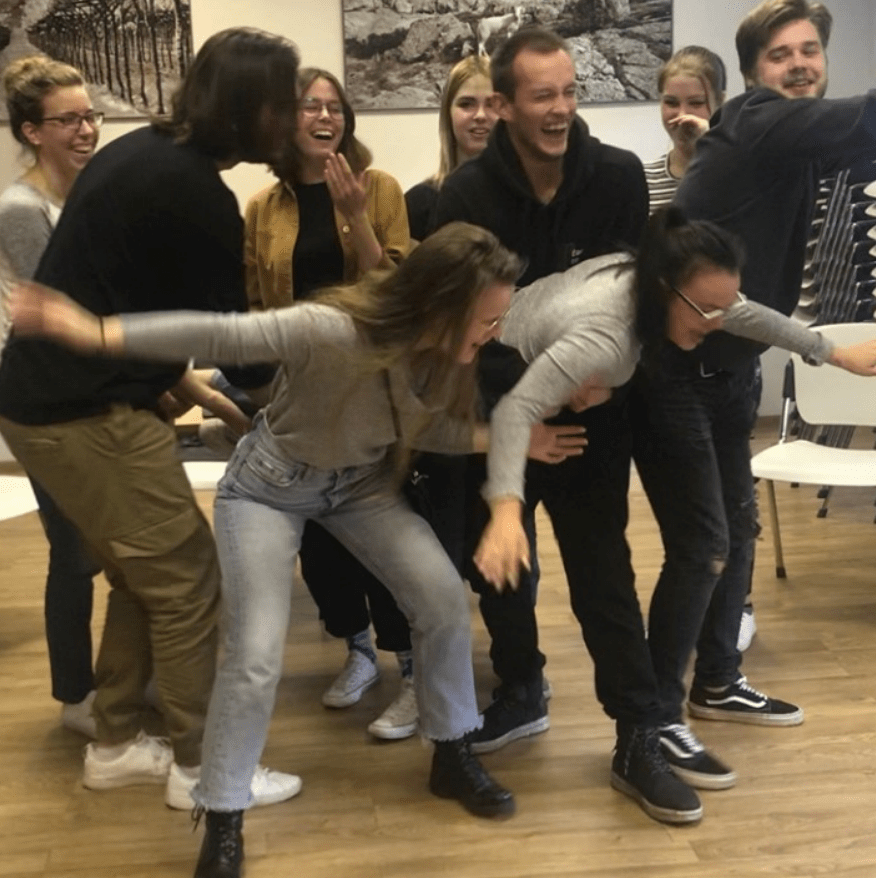 Human building blocks. Youth become a bird.